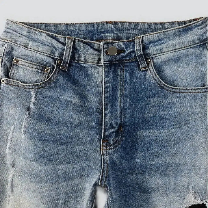 Black-patch whiskered jeans