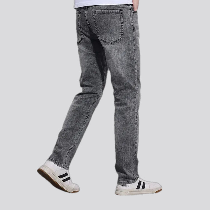 Abraded stonewashed slim men's jeans